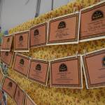 Memorial certificates are displayed on a memory wall in the Homer High School Commons as part of the Mozart Requiem performance on Friday, May 1, 2026, in Homer, Alaska. (Delcenia Cosman/Homer News)