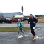 John Erickon (right) and Marshal Erickson compete in the annual Migration Run on Sunday, May 10<ins>, 2026,</ins> on the Homer Spit Trail<ins> in Homer, Alaska</ins>. (Delcenia Cosman/Homer News)