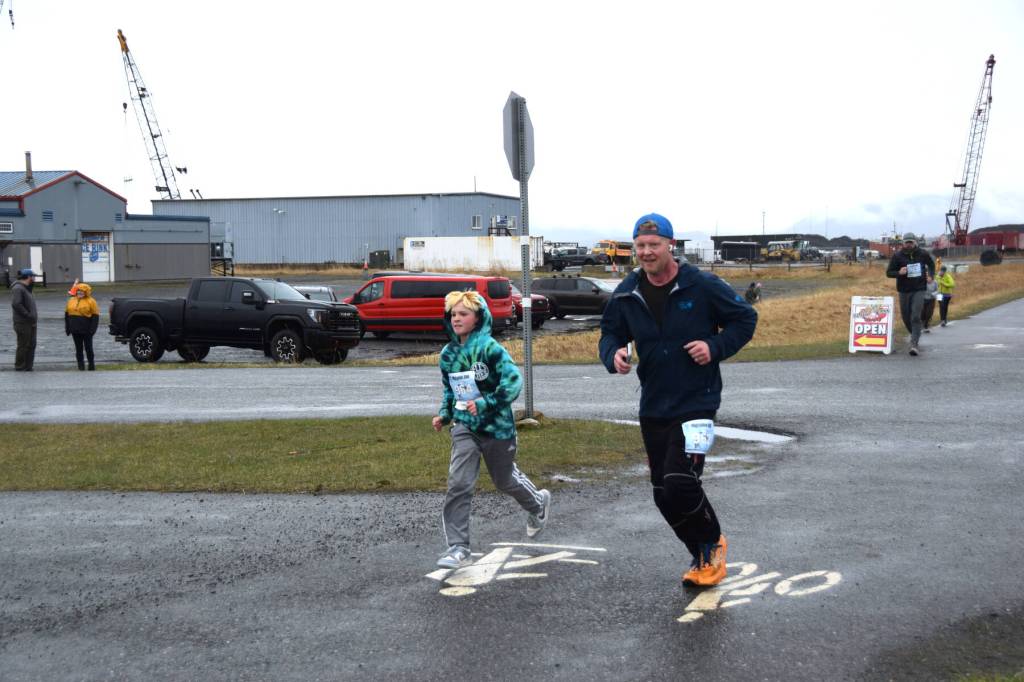 John Erickon (right) and Marshal Erickson compete in the annual Migration Run on Sunday, May 10<ins>, 2026,</ins> on the Homer Spit Trail<ins> in Homer, Alaska</ins>. (Delcenia Cosman/Homer News)
