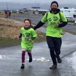 Let Me Run program mentors and youth participants run together in a celebratory 5K race on Sunday, May 10, 2026, on the Homer Spit Trail in Homer, Alaska. Photo courtesy Marcee Gray