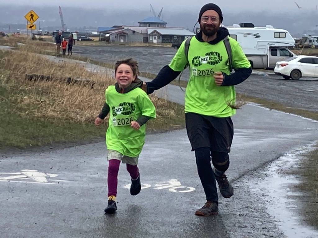 Let Me Run program mentors and youth participants run together in a celebratory 5K race on Sunday, May 10, 2026, on the Homer Spit Trail in Homer, Alaska. Photo courtesy Marcee Gray
