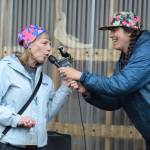 Bonnie (left) reenacts her award-winning raven imitation at the ninth annual Shorebird Festival bird calling contest on Saturday<ins>, May 9, 2026,</ins> at the Homer Brewing Company<ins> in Homer, Alaska</ins>. (Delcenia Cosman)