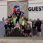 PHOTOS BY Whitney Bogatko
Members of the Anchor Kings Wrestling Club pose on the podium after winning state championship titles earlier this year.