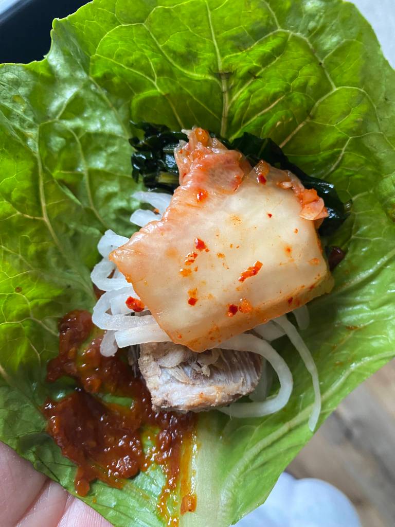 Photo by Tressa Dale/Peninsula Clarion
Bo ssam, or Korean roast pork wraps, paired with endless side dishes creates a fun food experience.