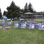 Delcenia Cosman/Homer News
Signs celebrating the 2026 graduating class of Homer High School decorate the lawn at WKFL Park on Friday, May 15.<ins>, 2026, in Homer, Alaska</ins>