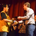 Delcenia Cosman/Homer News
Graduating senior Thomas Allowan (left) receives his diploma from Homer Flex High School principal Christopher Brown during a commencement ceremony held Monday, May 18.<ins>, 2026, in Homer, Alaska</ins>