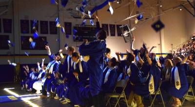 Delcenia Cosman/Homer News
Members of the 2026 graduating class of Homer High School throw their caps in the air in celebration at the conclusion of their commencement ceremony on Monday, May 18, <ins>, 2026,</ins> in the Homer High School Alice Witte Gymnasium<ins> in Homer, Alaska</ins>.