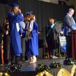 Graduating seniors cross the stage to receive their diplomas during a commencement ceremony on Monday, May 18<ins>,</ins> <ins>2026</ins>, in the Homer High School Alice Witte Gymnasium<ins> in Homer, </ins><ins>Alaska</ins>. (Delcenia Cosman/Homer News)