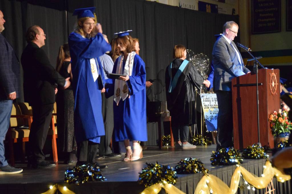 Graduating seniors cross the stage to receive their diplomas during a commencement ceremony on Monday, May 18<ins>,</ins> <ins>2026</ins>, in the Homer High School Alice Witte Gymnasium<ins> in Homer, </ins><ins>Alaska</ins>. (Delcenia Cosman/Homer News)