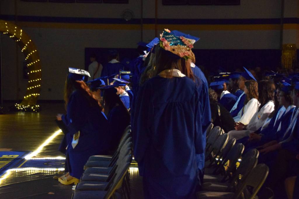 Members of the Homer High School graduating class line up to proceed to the stage and receive their diplomas during a commencement ceremony on Monday, May 18<ins>,</ins><ins> 2026,</ins> in the Homer High School Alice Witte Gymnasium<ins> in Homer, </ins><ins>Alaska</ins>. (Delcenia Cosman/Homer News)