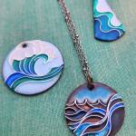 Enambled pendants by Counsel Langley, one of several newer artist members at Ptarmigan Arts Coop Gallery (Photo provided by Ptarmigan Arts)