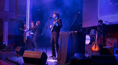 Photos courtesy of La Jolla Booking Agency
The Beatles vs. Stones – Musical Showdown tour rolls into Soldotna Creek Park on June 20 at 7:30 p.m. with two of the most revered tribute bands in the worldAbbey Road, channeling The Beatles, and Start Me Up, embodying The Rolling Stones.