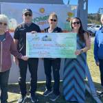 Courtesy Homer Steps Up
The Cutting Edge team of Jonathon Bloch, Maria Bloch, Nathan Kincaid, Misty Kincaid and Jess Jule came in first in the Homer Steps Up community walking challenge, earning $500 to donate to Homer Animal Friends.