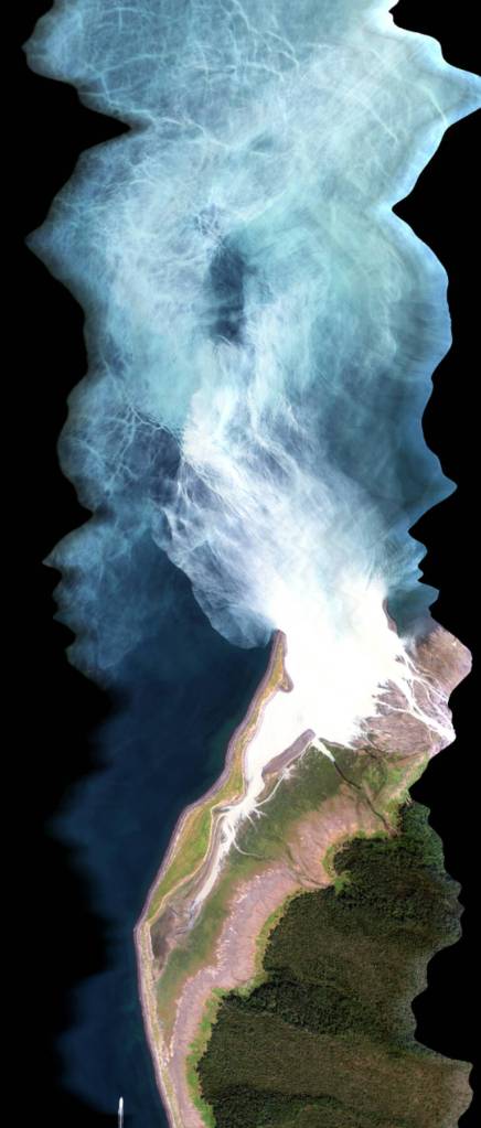 This hyperspectral image captures the mouth of Grewingk Creek, a glacial stream that originates at Grewingk Lake and drains the catchment of Grewingk Glacier, where it enters Kachemak Bay southeast of Homer. The creek water is milkier than the bays ocean water because it contains glacial sediments. (Photo by Martin Stufer/HyLab)