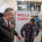 Governor Mike Dunleavy shares a laugh with Mike Rowe and Bay Weld employee Kele Bottineau in Homer July 23 as Wells Fargo provided $250,000 for the Alaska Vocational and Technical Center. (Courtesy of Wells Fargo)