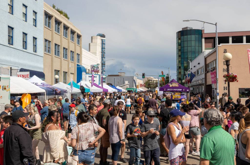 Alaskans and visitors enjoy the annual Midnight Sun Festival in downtown Fairbanks on June 24, 2023. (Photo by David Brossard )